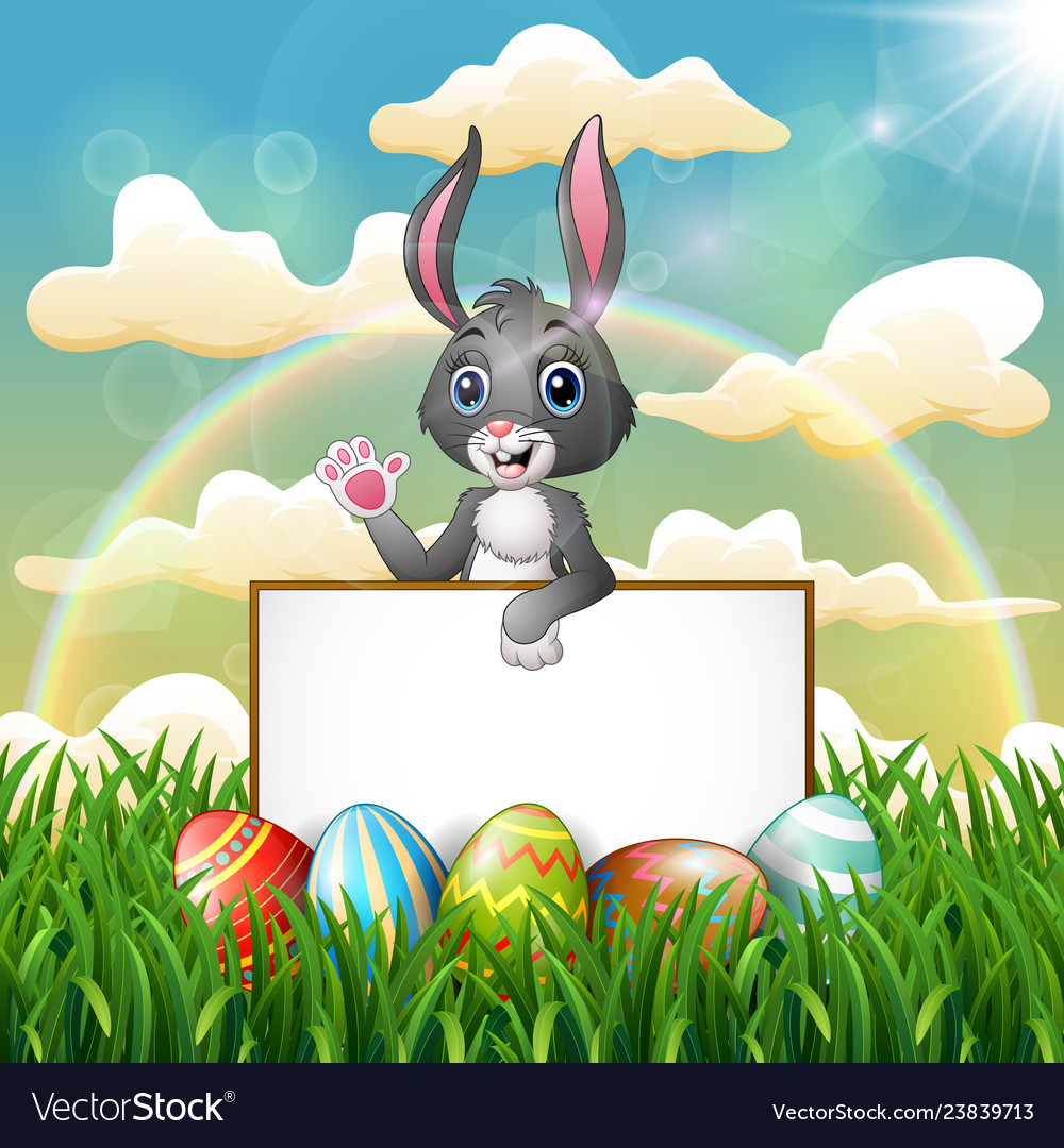 Cartoon bunny holding blank sign on the field Vector Image