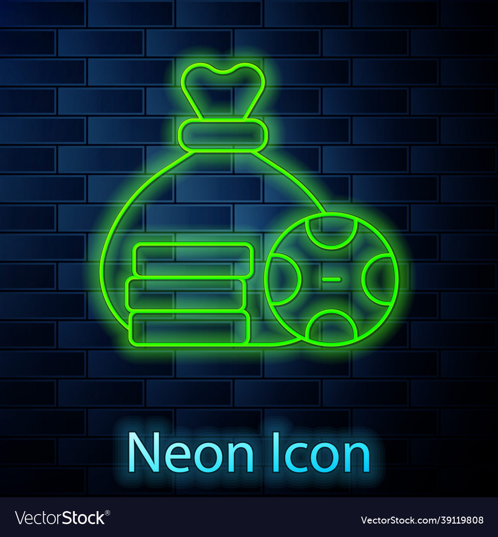 Glowing neon line money bag icon isolated on brick