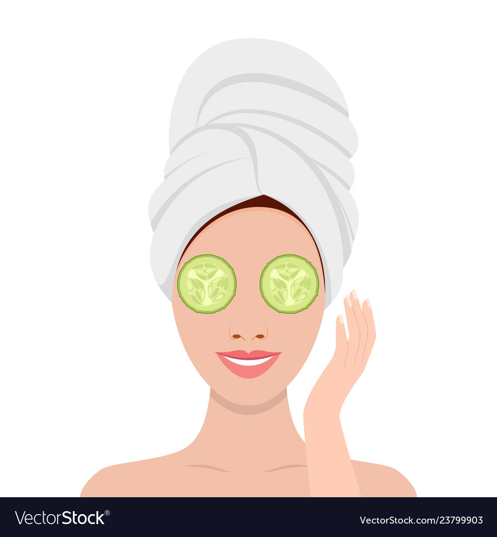 Woman with mask of cucumber on her eyes