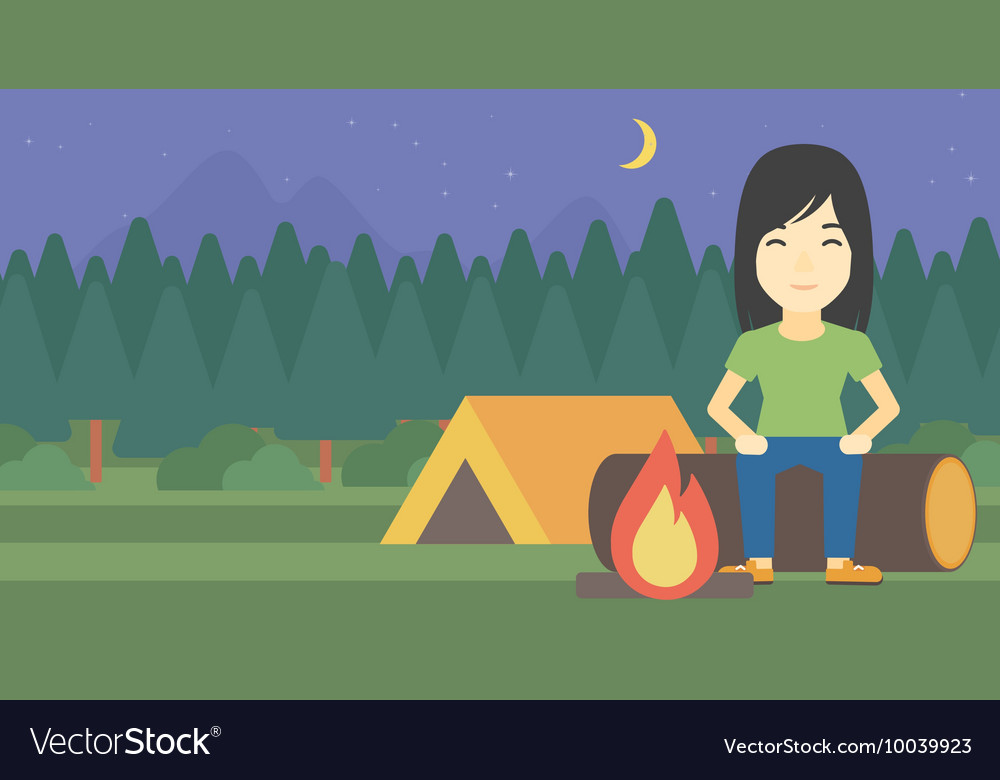 Woman sitting on log in the camping