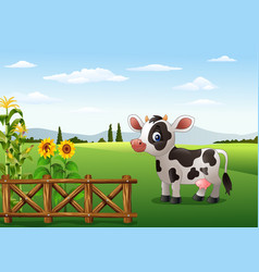 Cartoon happy donkey with farm background Vector Image