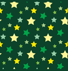 Seamless pattern in yellow and green stars Vector Image