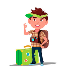 Little traveler girl with suitcase cap on his Vector Image