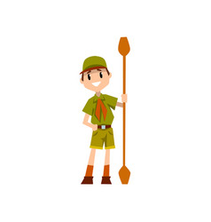 Boy scout character in uniform cooking food in the