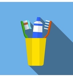 Toothbrush toothpaste in a glass Royalty Free Vector Image
