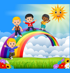 Happy kids standing over rainbow Royalty Free Vector Image