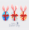 easter eggs and rabbit ears with red ribbon vector image