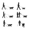 blind people with guide dog walking silhouettes vector image