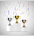 gold silver and bronze trophy cup on prize podium vector image