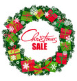 christmas sale poster wreath with gift boxes vector image vector image