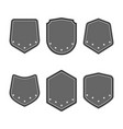 set of black shields with stars in trendy flat vector image