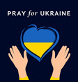 pray for peace ukraine with hands and heart vector image vector image