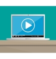 laptop on desktop with running web video player vector image