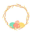 easter wreath made of willow branches and painted vector image vector image