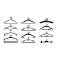clothes hanger black silhouette set icon vector image