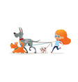 little redhead girl walking three dog on leash vector image