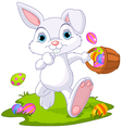 easter bunny hiding eggs vector image vector image
