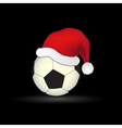 soccer and football ball with red santa hat eps10 vector image