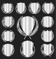silver shields collection on black background vector image vector image