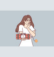 frightened woman holding bomb in hands panicking vector image vector image