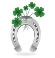 horseshoe and four leaf clover vector image