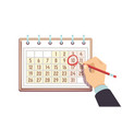 hand with pen marks date in calendar deadline vector image