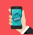 fake news word on smartphone vector image