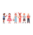 set of happy children celebrating easter egg hunt vector image