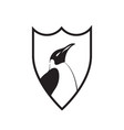 stylized penguin on a shield vector image