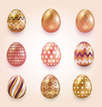 a set of golden eggs with small floral vector image