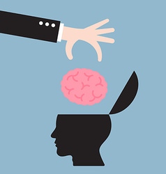 businessman-hand-put-brain-in-human-head