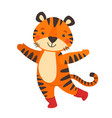 cute orange tiger waving his paw vector image vector image