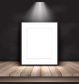 blank picture leaning against chalkboard vector image vector image