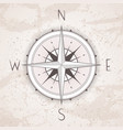 with a vintage compass or wind rose on grunge vector image