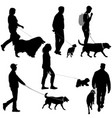 set silhouette of people and dog on a white vector image