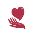 heart in hand logo health care love symbol vector image vector image