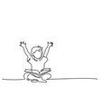 happy boy reading open books sitting on floor vector image