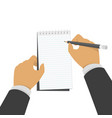 hand holding notebook and pencil vector image vector image