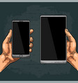 male hand holding a modern mobile phone vintage vector image vector image