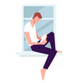 man sitting on window reading book at home vector image vector image
