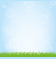 field of green grass and blue sky background vector image