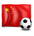 a soccer ball in front of the chinese flag vector image vector image