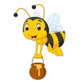 cartoon bee holding honey bucket vector image