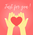 two hands holding the heart vector image