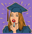 university graduate girl paints lips with lipstick vector image vector image