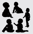baby playing silhouette vector image