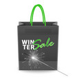 black shopping bag with text winter sale vector image