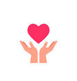 hands holding red heart vector image