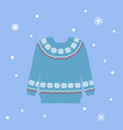 knitted sweater with scandinavian ornament on blue vector image vector image