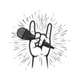 music symbol or emblem microphone in hand vector image vector image